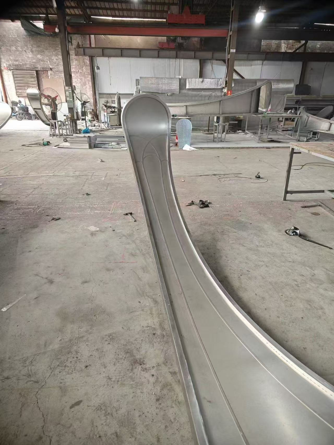 LINDELACR Foshan: one hyperbolic aluminum petal after compound forming, before coating