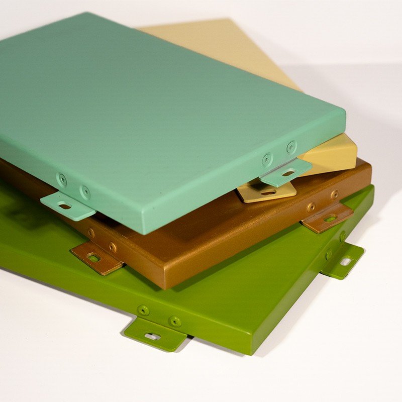 Coated aluminum cassettes in several colors, with brackets and fixing holes in the same finish