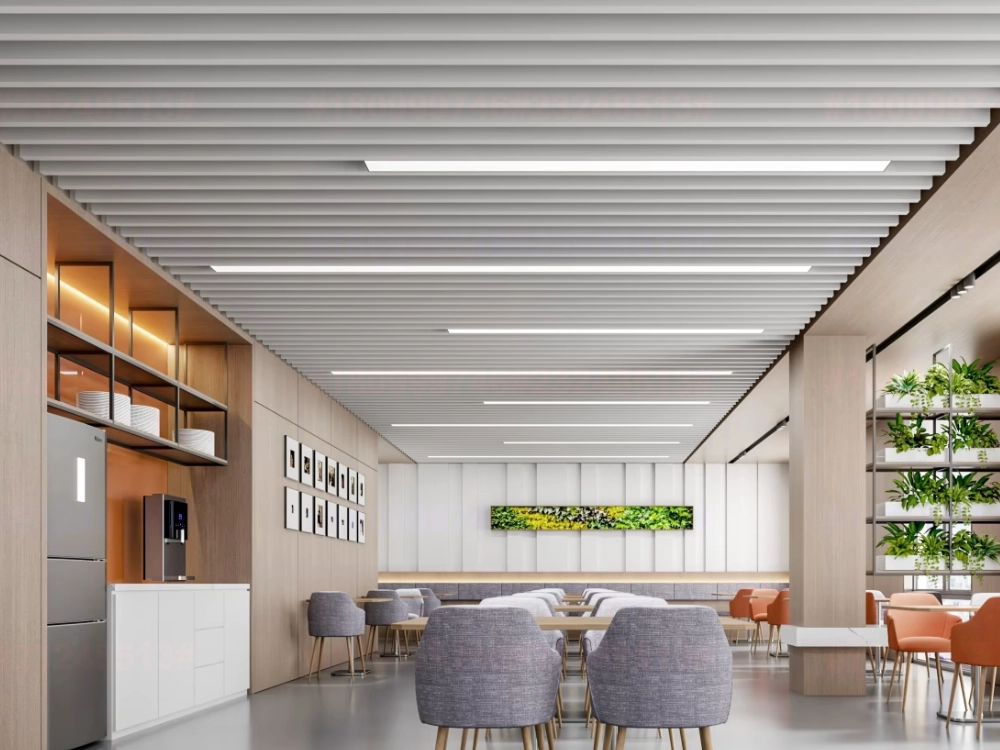 White U-baffle ceiling over a lounge: recessed linear lights, open plenum, full access between slats